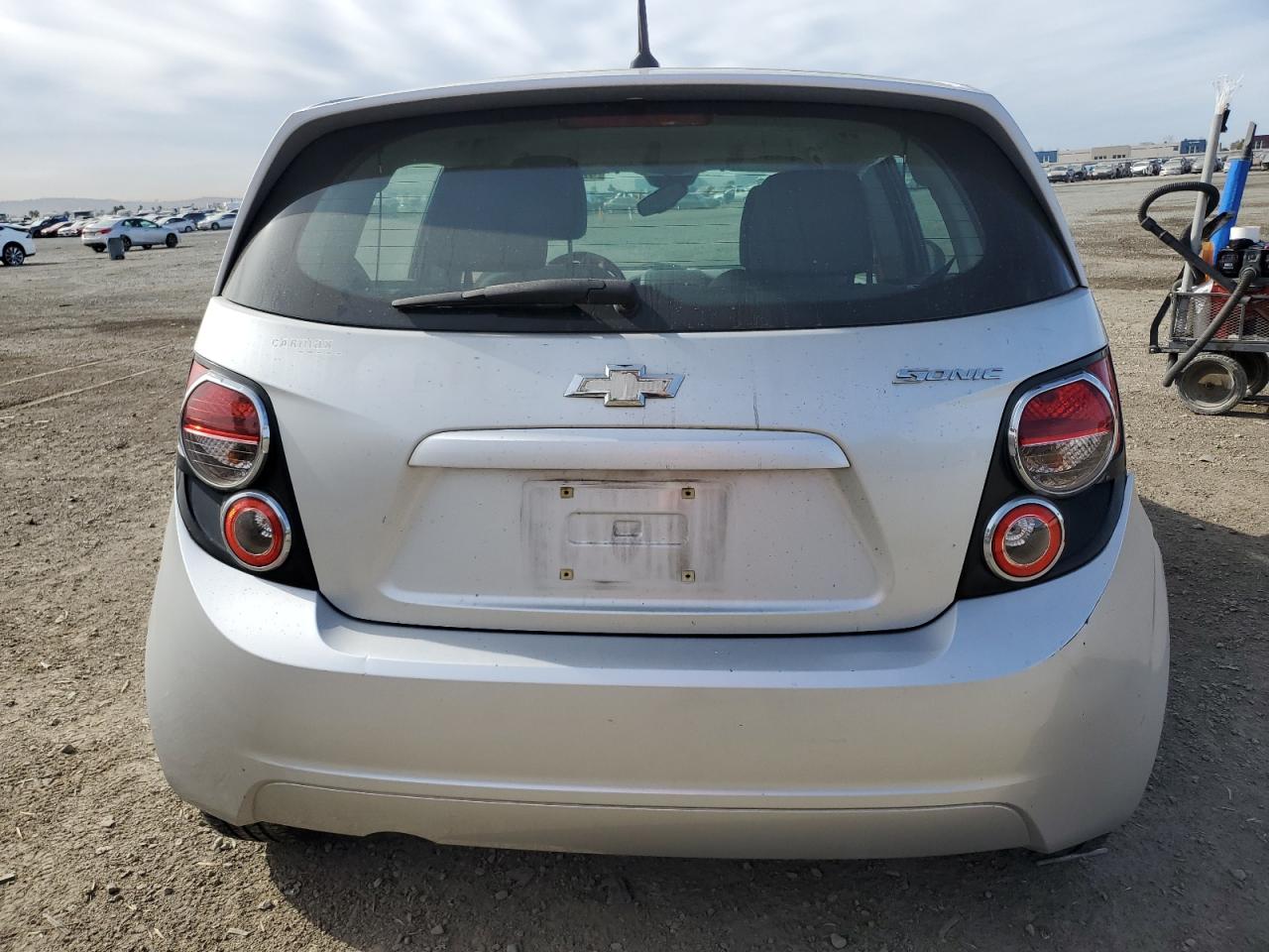2013 Chevrolet Sonic VIN 1G1JB6SH9D4215002 Copart auction photo, all over damage thumbnail 6