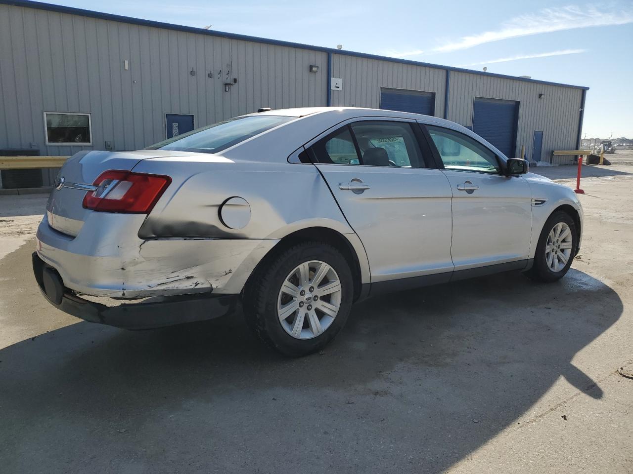 2012 Ford Taurus VIN 1FAHP2DW4CG122242 Copart auction photo, rear end / hail damage thumbnail 3