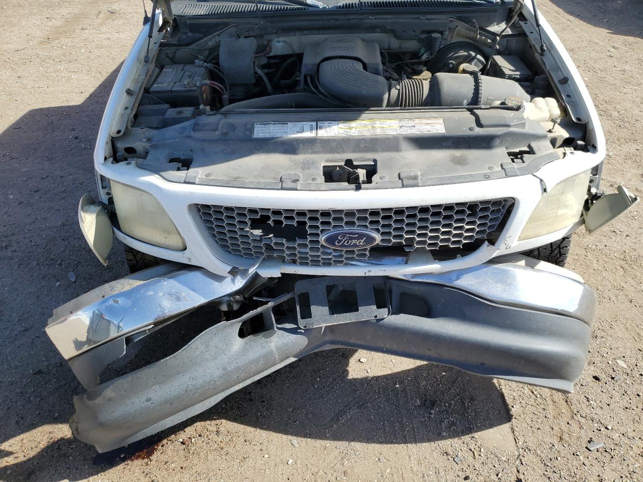 1999 Ford F-150 VIN 1FTRX17W5XKB00077 Copart auction photo, front end damage thumbnail 11
