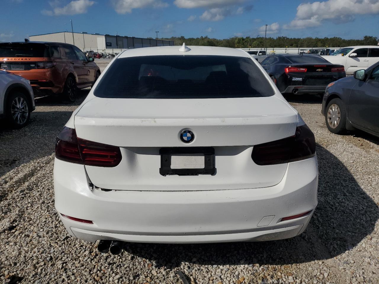 2013 BMW 3er VIN WBA3A5G5XDNP24289 Copart auction photo, rear end / water/flood damage thumbnail 6
