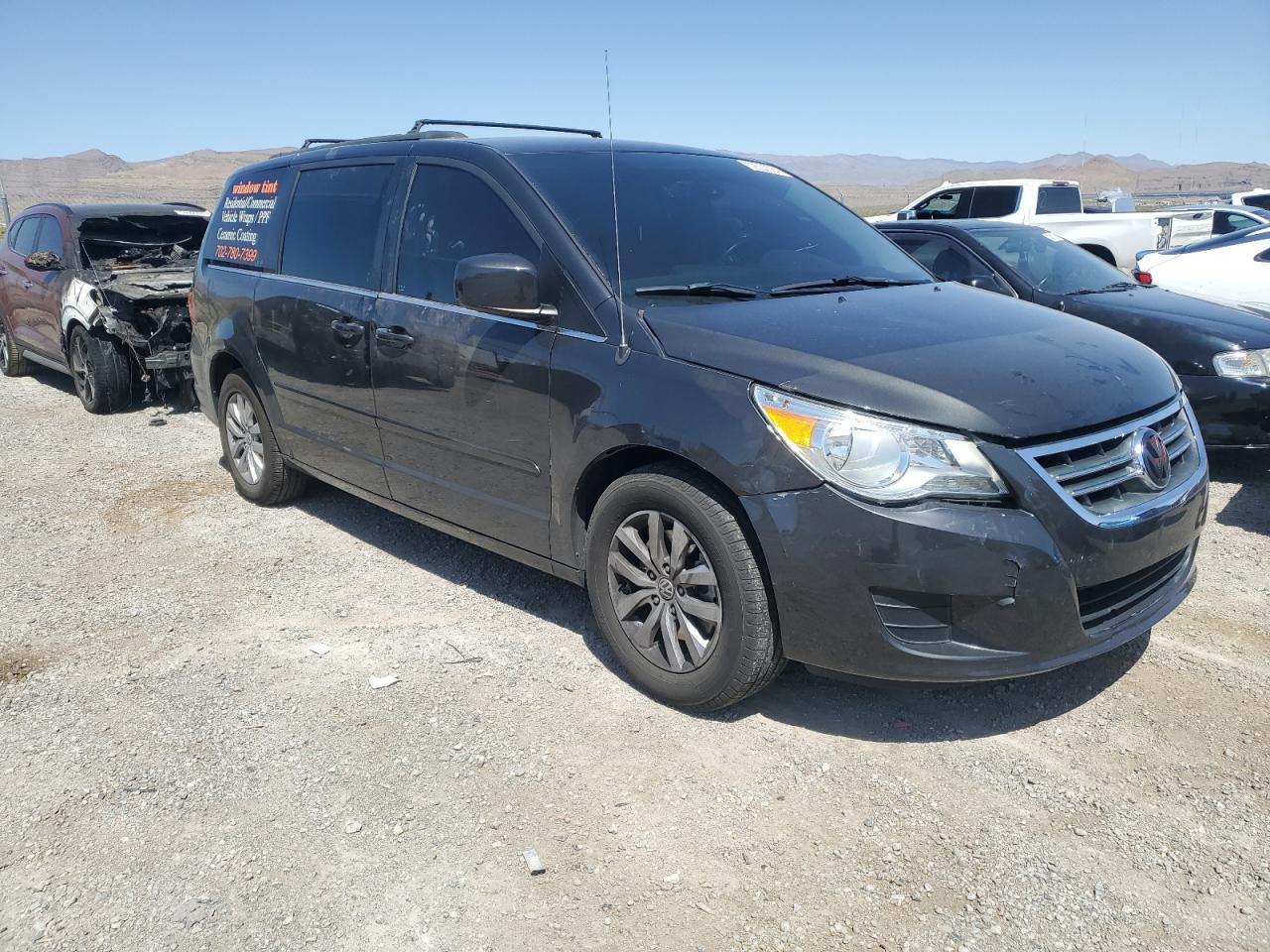 2012 Volkswagen Routan VIN 2C4RVABG7CR354620 Copart auction photo, front end damage thumbnail 4