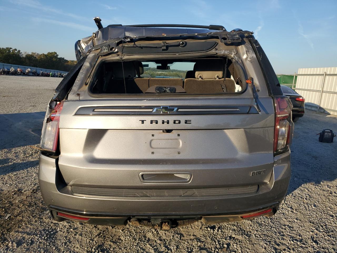 2021 Chevrolet Tahoe VIN 1GNSKPKD8MR379060 Copart auction photo, rear end / all over damage thumbnail 6