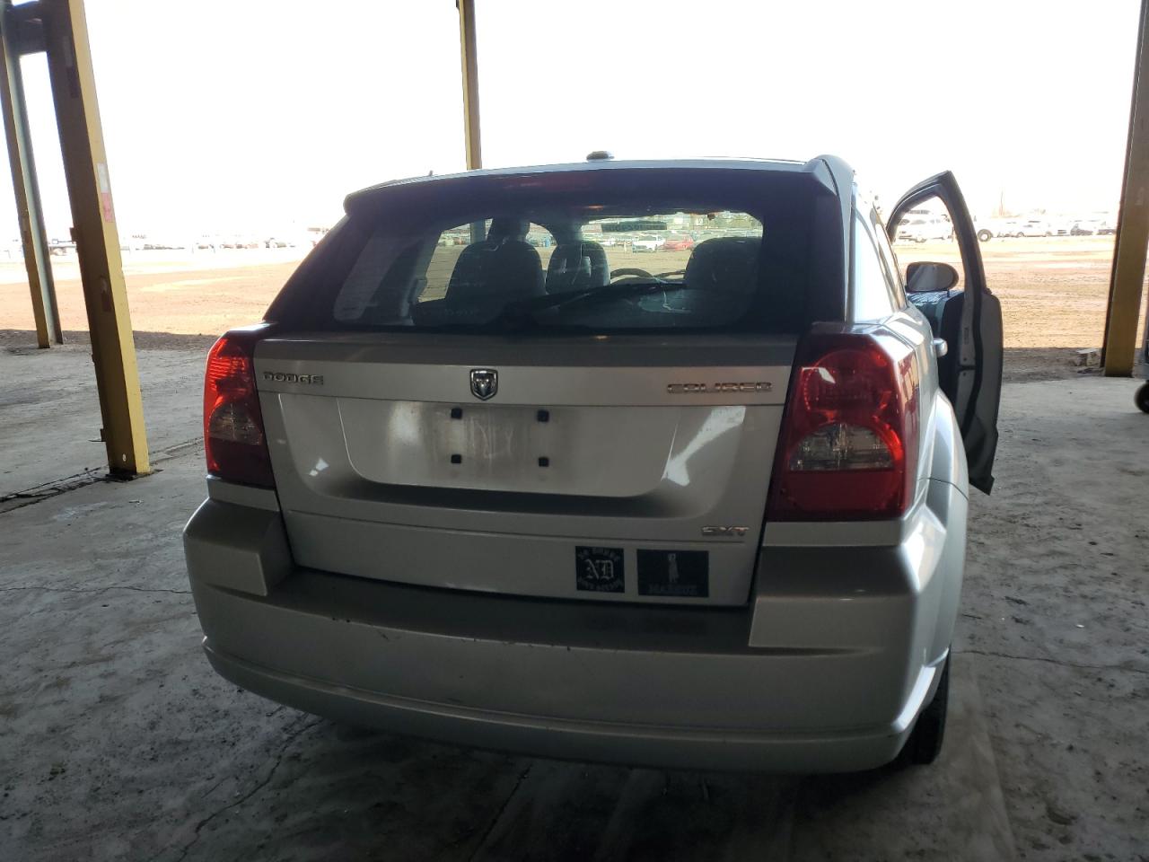 2009 Dodge Caliber VIN 1B3HB48A69D157699 Copart auction photo, vandalism / side damage thumbnail 6