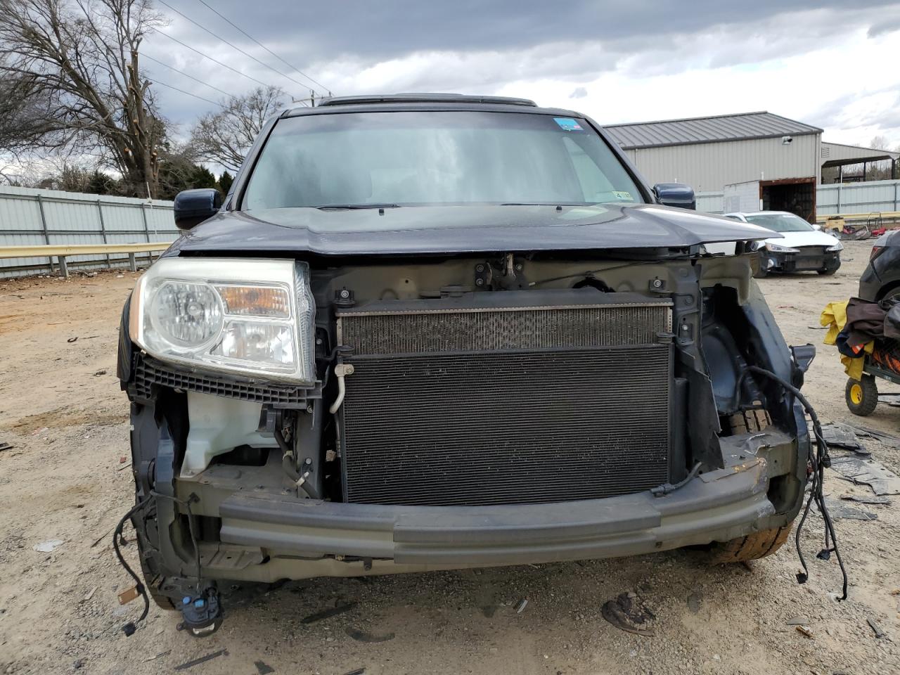 2012 Honda Pilot VIN 5FNYF3H98CB030553 Copart auction photo, front end / all over damage thumbnail 5