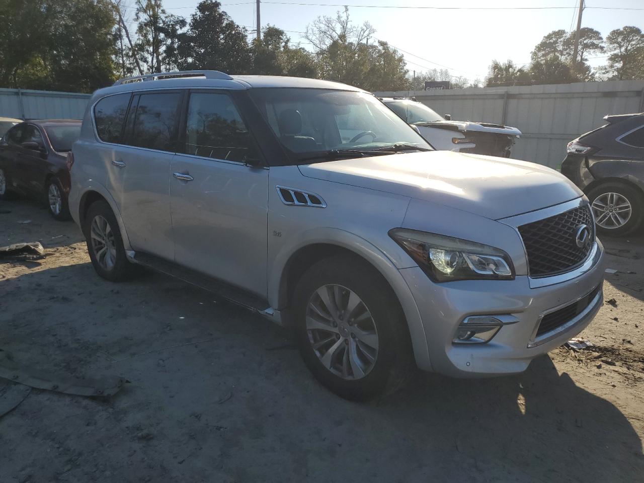 2015 Infiniti QX80 VIN JN8AZ2NE0F9083884 Copart auction photo, side damage thumbnail 4