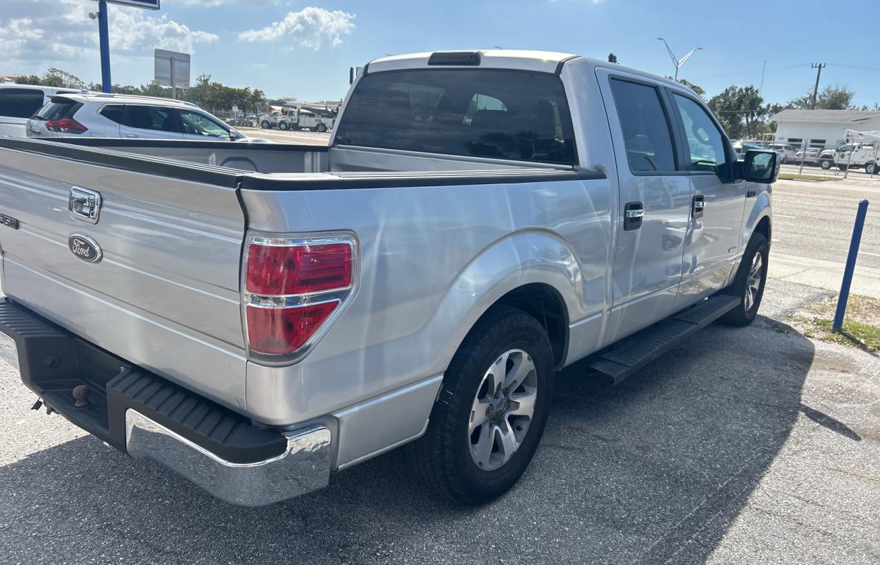 2014 Ford F-150 VIN 1FTFW1CT9EKE70981 Copart auction photo, normal wear damage thumbnail 4