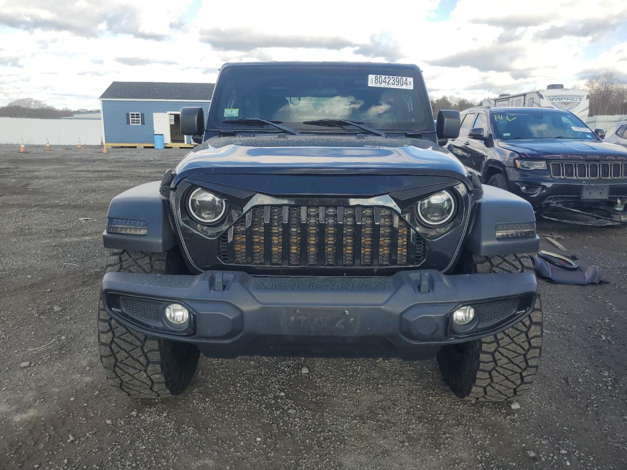 2020 Jeep Wrangler VIN 1C4GJXAN3LW245519 Copart auction photo, undercarriage / minor dent/scratches damage thumbnail 5