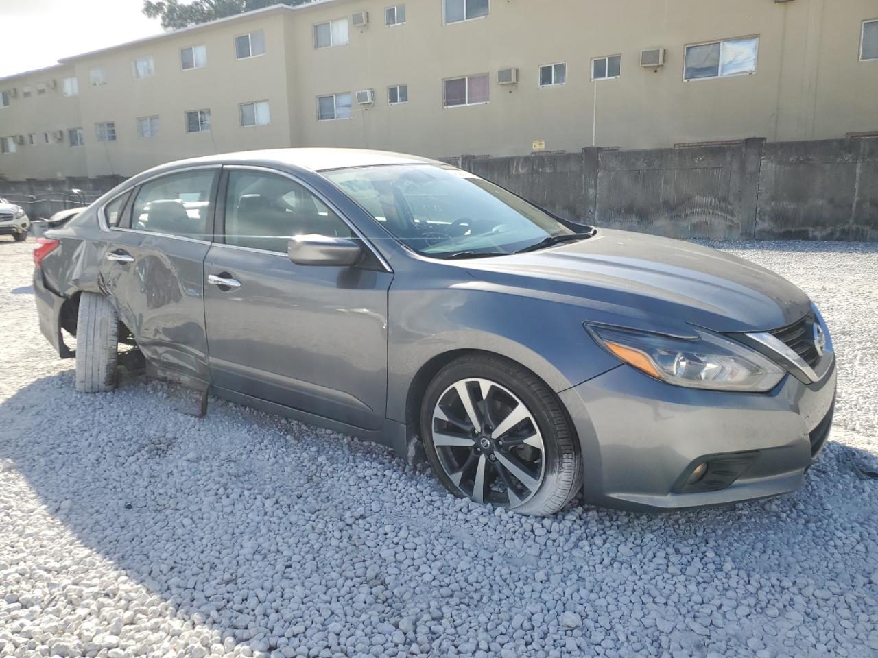 2016 Nissan Altima VIN 1N4AL3AP6GC118884 Copart auction photo, undercarriage / side damage thumbnail 4