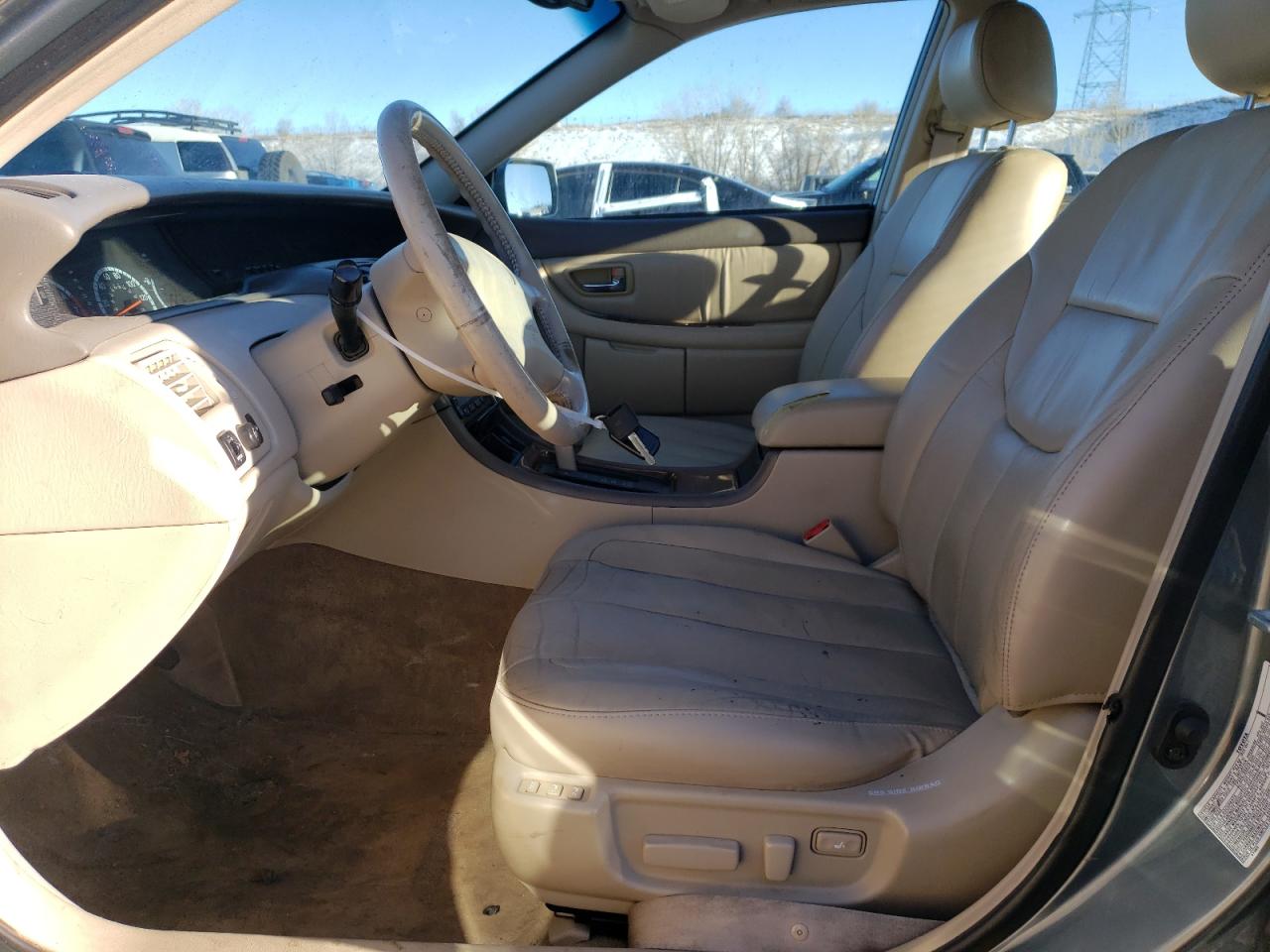 2000 Toyota Avalon VIN 4T1BF28B2YU070382 Copart auction photo, front end / hail damage thumbnail 7