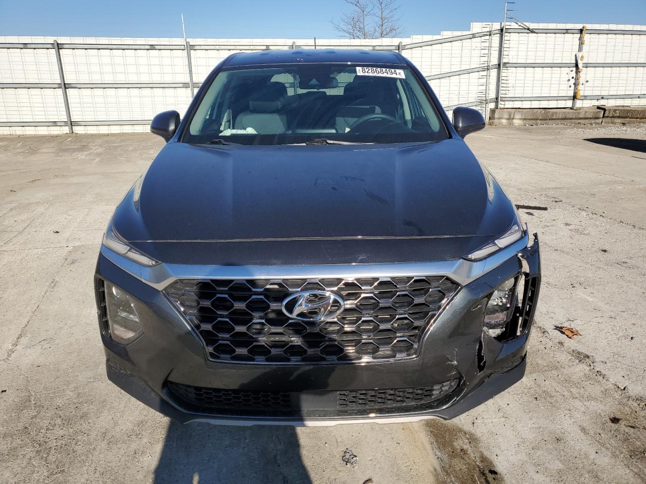 2020 Hyundai Santa Fe VIN 5NMS2CAD7LH184864 Copart auction photo, side / front end damage thumbnail 5