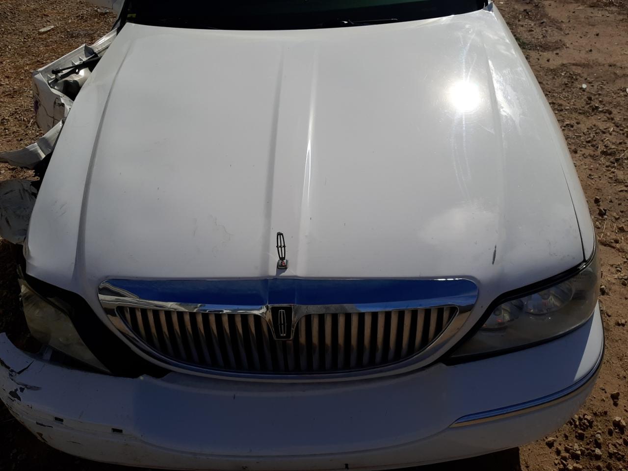 2010 Lincoln Town Car VIN 2L1FL8JWXAX752839 Copart auction photo, front end damage thumbnail 11