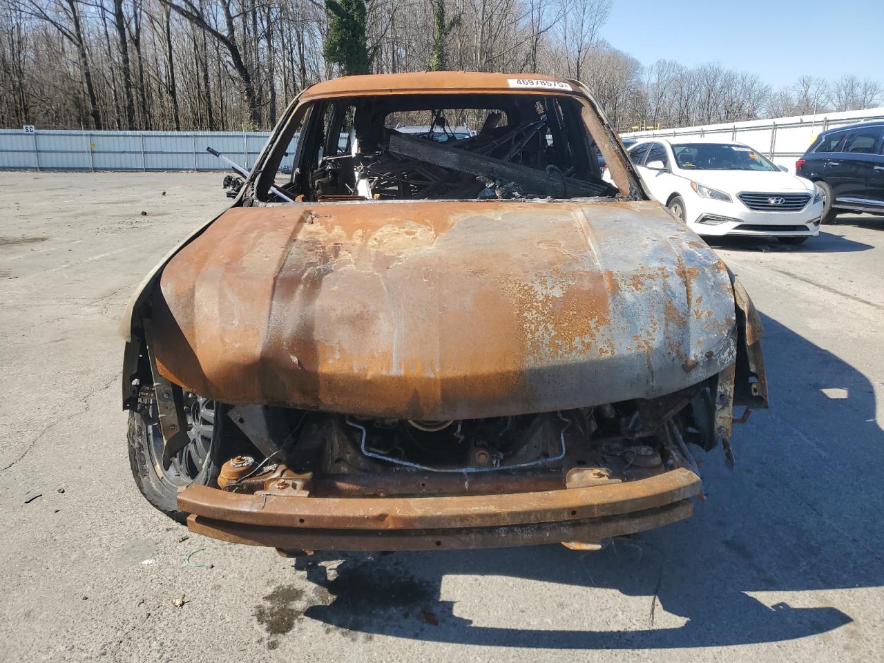 2010 Chevrolet Tahoe VIN 1GNMCAE02AR257012 Copart auction photo, burn damage thumbnail 5
