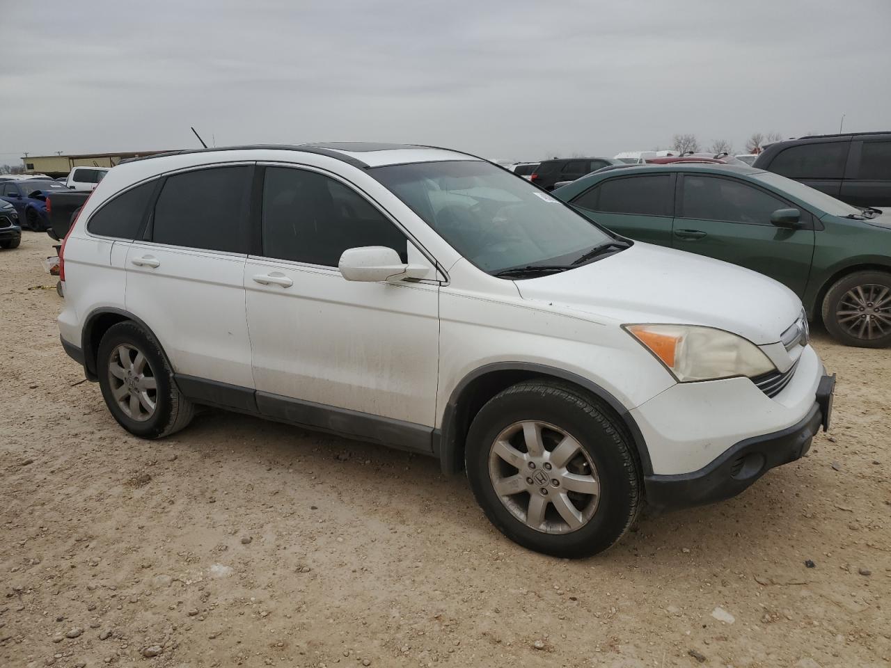 2009 Honda CR-V VIN JHLRE38749C010265 Copart auction photo, side / minor dent/scratches damage thumbnail 4