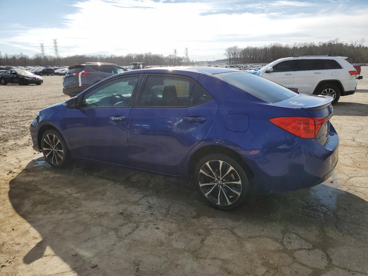 2018 Toyota Corolla VIN 5YFBURHE8JP768317 Copart auction photo, side / front end damage thumbnail 2