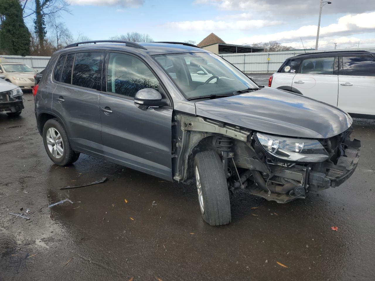 2015 Volkswagen Tiguan VIN WVGAV7AX5FW576047 Copart auction photo, front end damage thumbnail 4