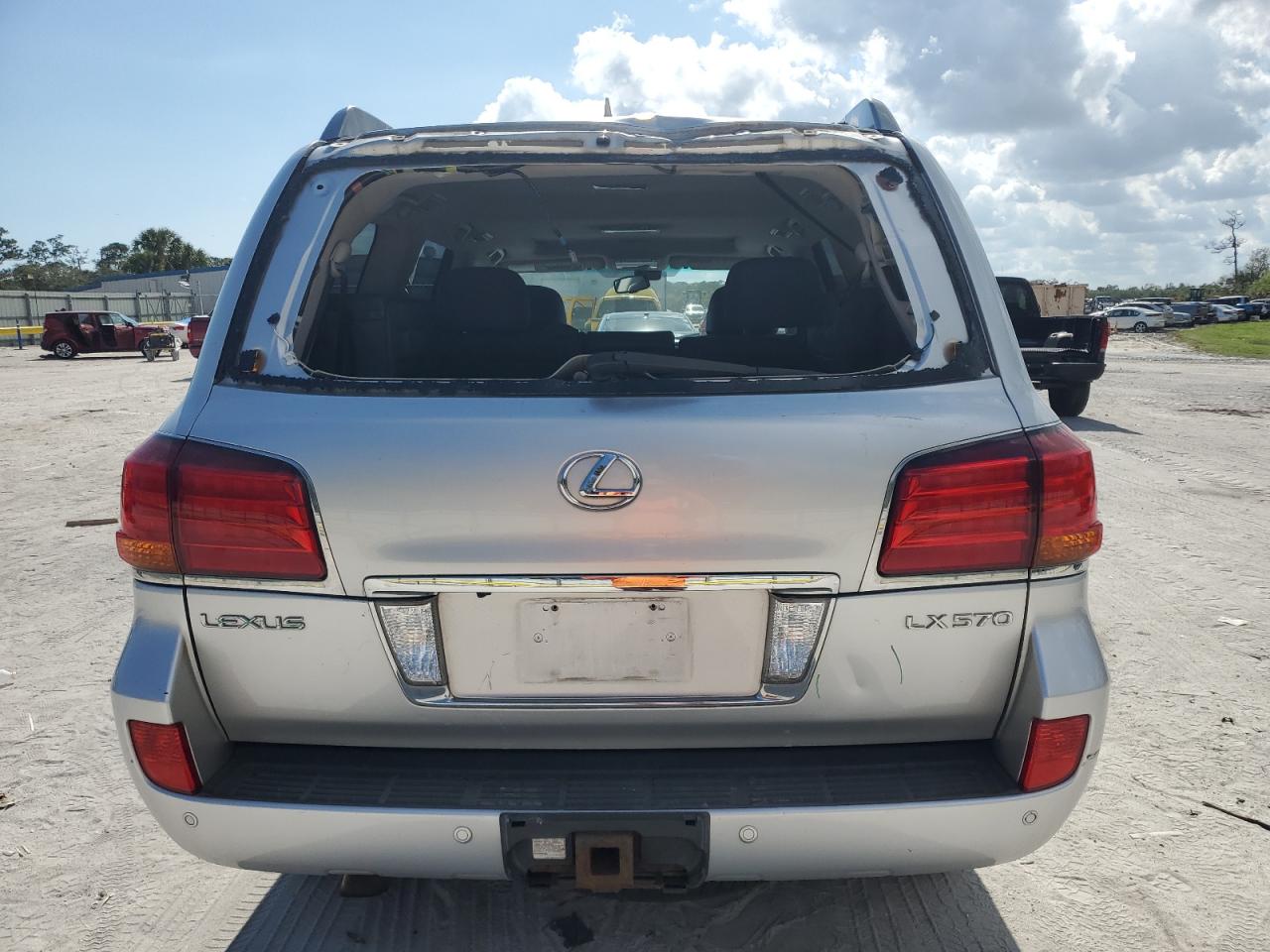 2010 Lexus LX VIN JTJHY7AX4A4042257 Copart auction photo, top/roof / rear end damage thumbnail 6