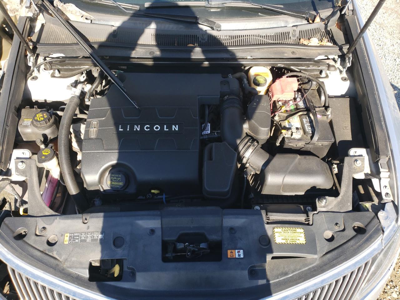 2013 Lincoln MKS VIN 1LNHL9DK7DG616975 Copart auction photo, front end / side damage thumbnail 12