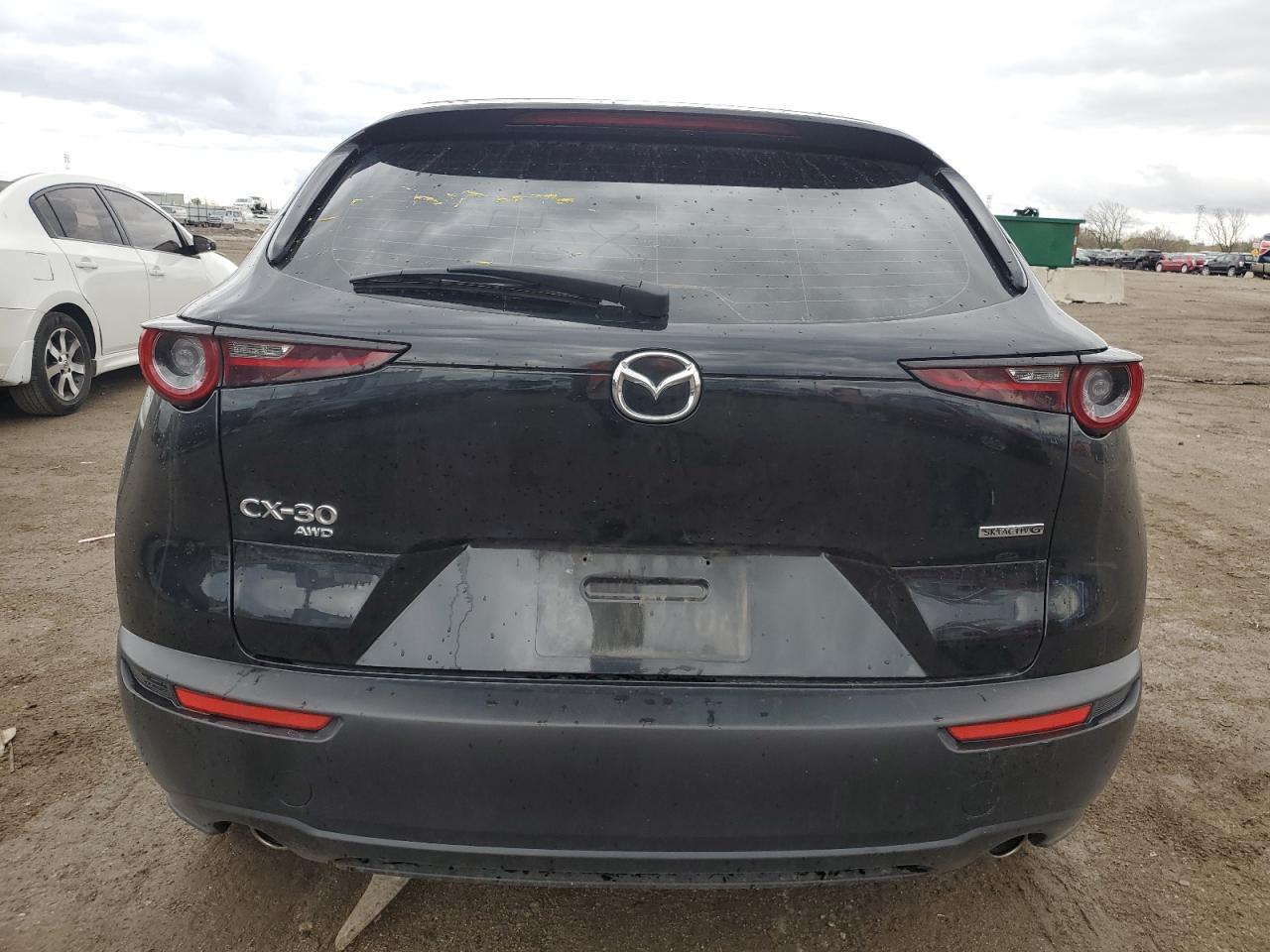 2022 Mazda CX-30 VIN 3MVDMBAL6NM423856 Copart auction photo, front end / side damage thumbnail 6