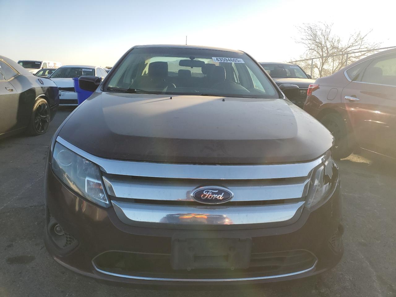 2011 Ford Fusion VIN 3FAHP0HA6BR324042 Copart auction photo, front end damage thumbnail 5