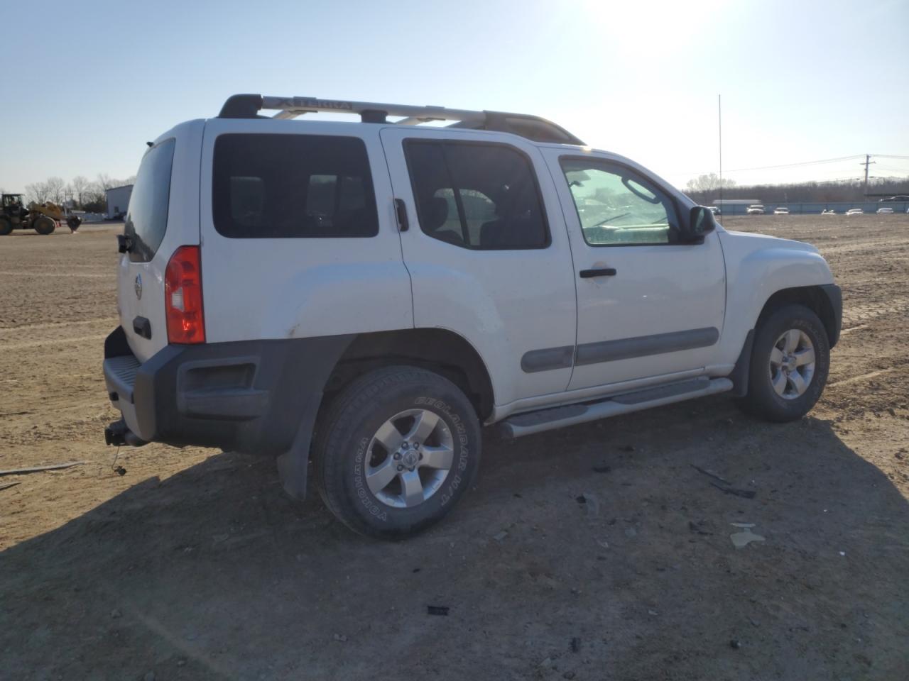 2011 Nissan XTerra VIN 5N1AN0NWXBC521579 Copart auction photo, side / front end damage thumbnail 3