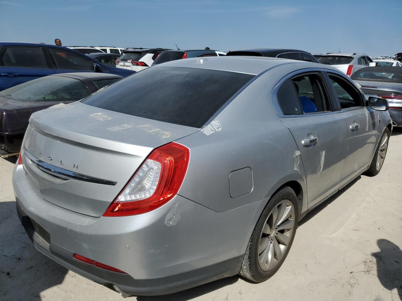 2016 Lincoln MKS VIN 1LNHL9DK0GG602095 Copart auction photo, water/flood damage thumbnail 3