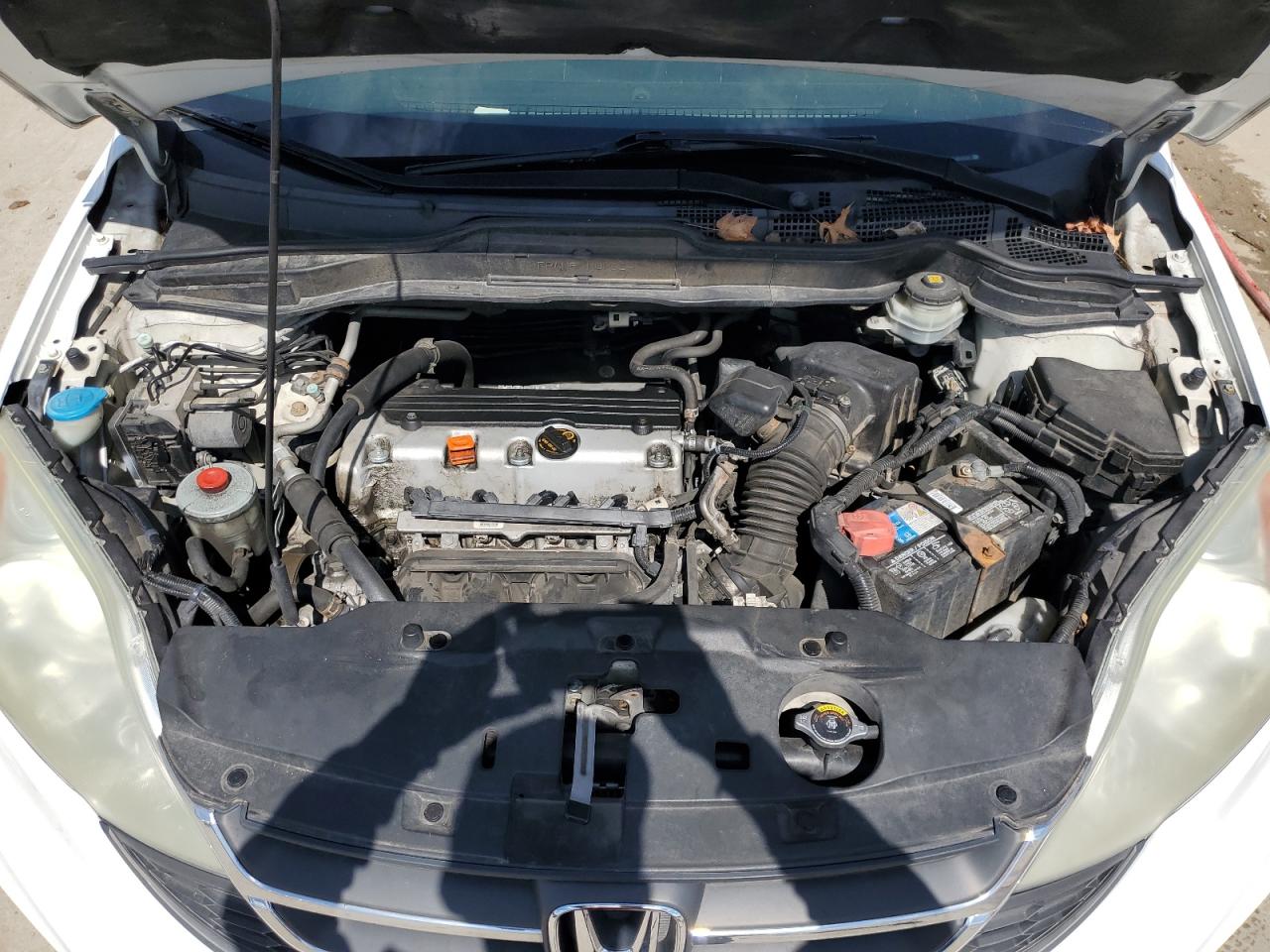 2010 Honda CR-V VIN 5J6RE4H33AL097350 Copart auction photo, side / front end damage thumbnail 12