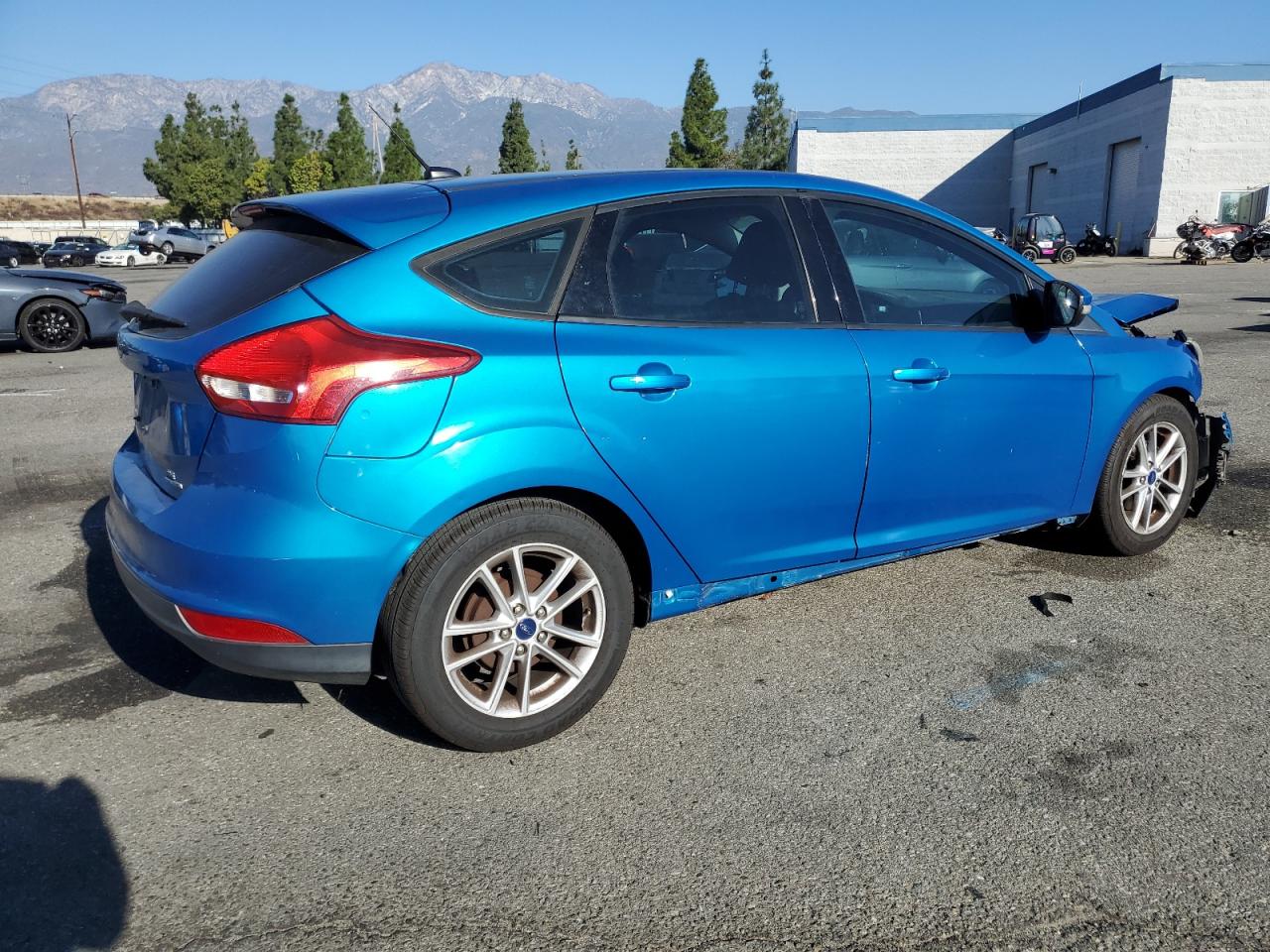 2015 Ford Focus VIN 1FADP3K28FL281765 Copart auction photo, side damage thumbnail 3