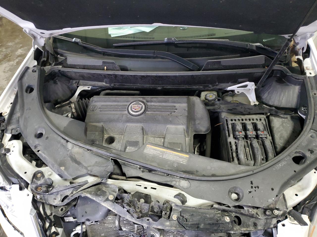 2015 Cadillac SRX VIN 3GYFNEE36FS574013 Copart auction photo, front end damage thumbnail 13
