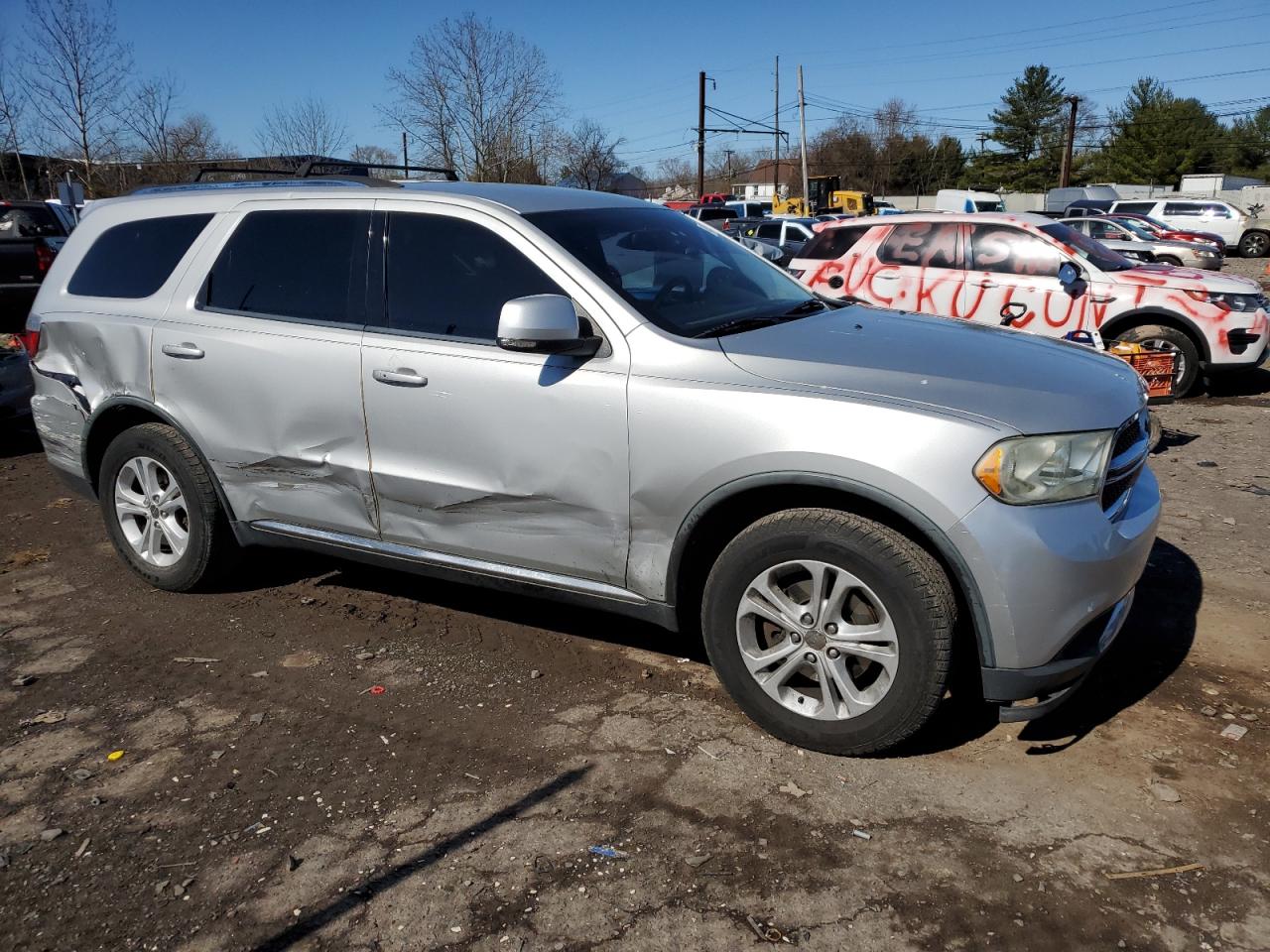 2011 Dodge Durango VIN 1D4RE4GG5BC667217 Copart auction photo, side / rear end damage thumbnail 4