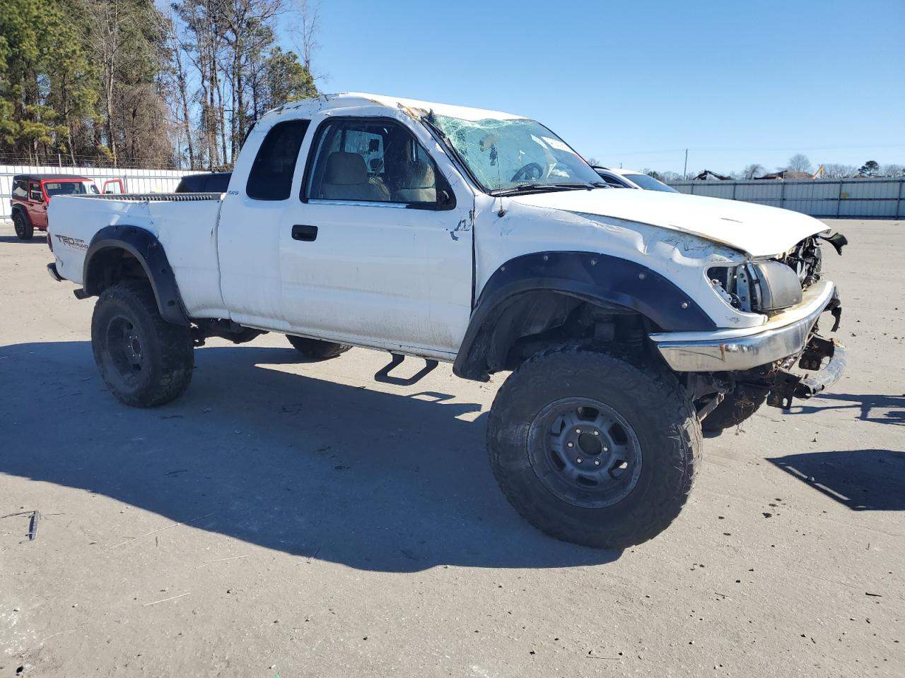 2003 Toyota Tacoma VIN 5TEWN72NX3Z256129 Copart auction photo, rollover damage thumbnail 4