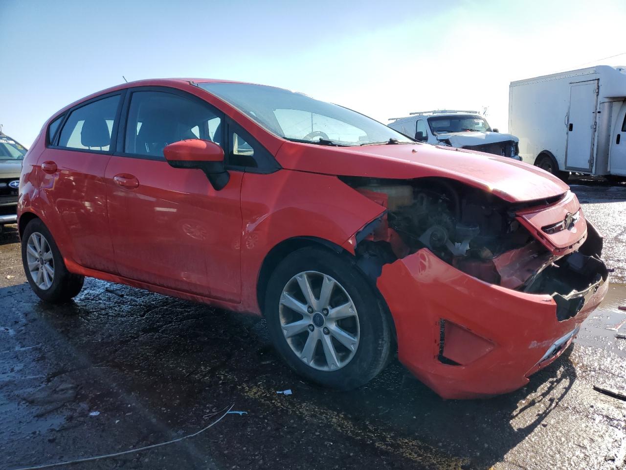 2012 Ford Fiesta VIN 3FADP4EJ9CM215485 Copart auction photo, front end / side damage thumbnail 4