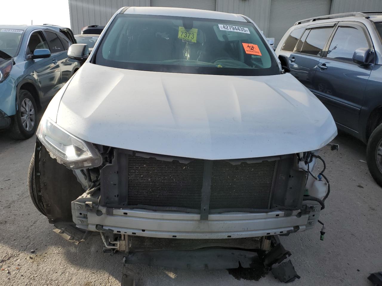 2020 Chevrolet Traverse VIN 1GNEVFKW8LJ283734 Copart auction photo, side / front end damage thumbnail 5