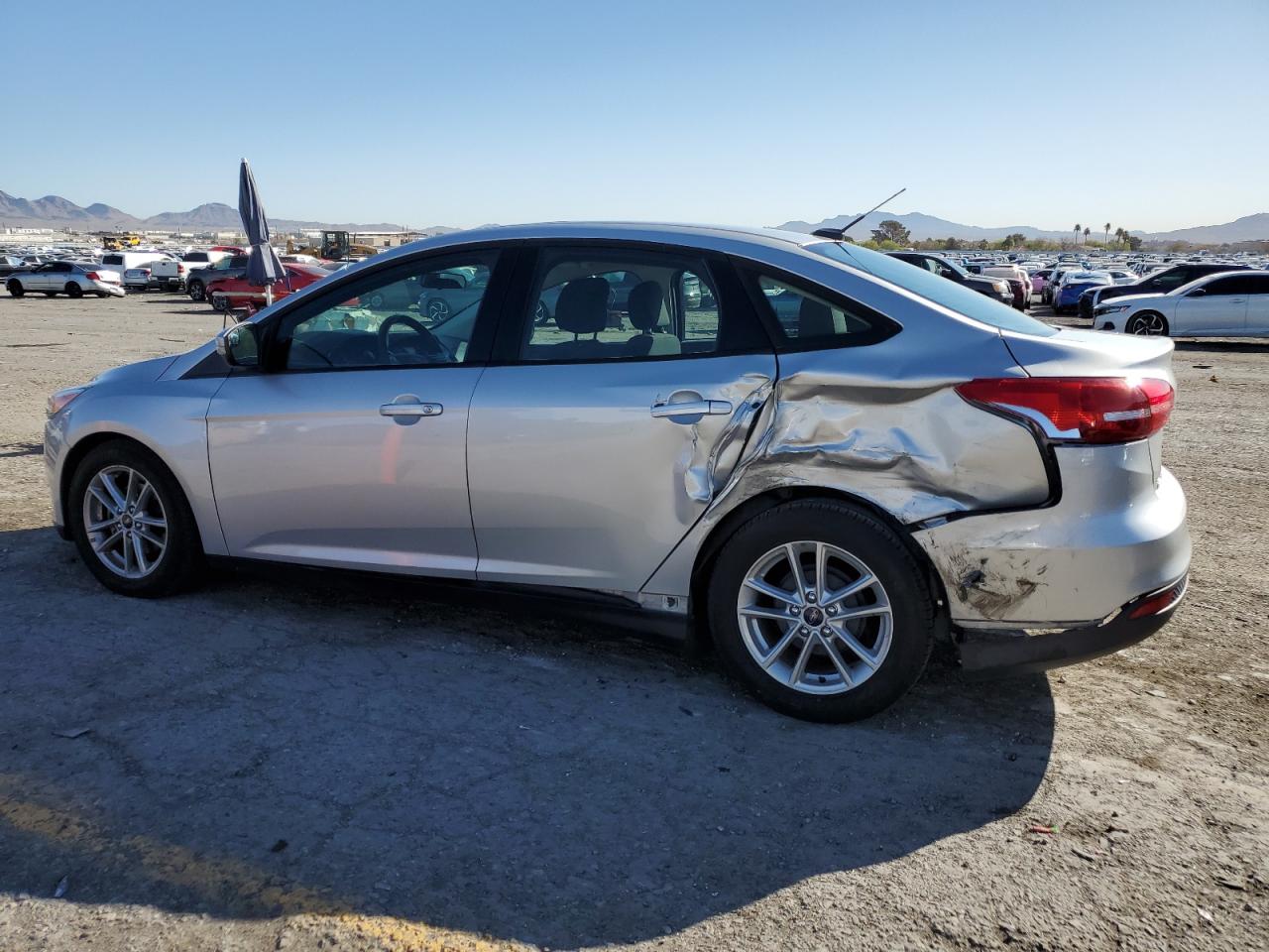 2016 Ford Focus VIN 1FADP3F22GL272362 Copart auction photo, side damage thumbnail 2
