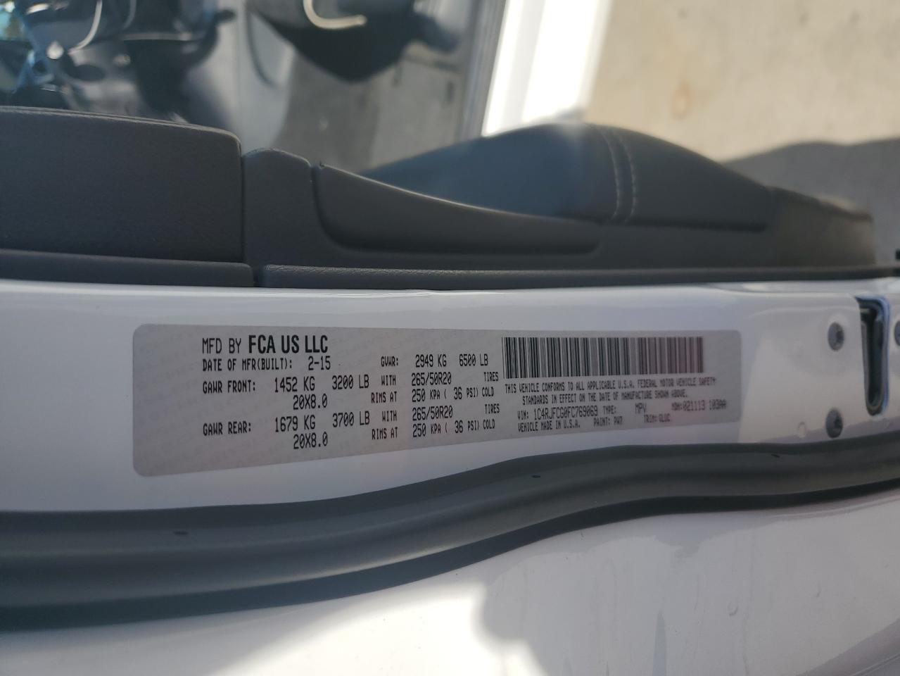 2015 Jeep Grand Cherokee VIN 1C4RJFCG0FC769069 Copart auction photo, rear end damage thumbnail 14