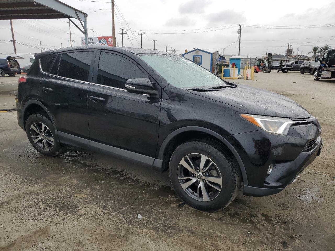 2018 Toyota RAV 4 VIN 2T3WFREV2JW477138 Copart auction photo, side / front end damage thumbnail 4