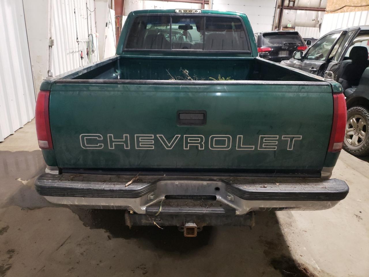 1999 Chevrolet GMT-400 VIN 1GCEK19R2XR123120 Copart auction photo, all over damage thumbnail 6