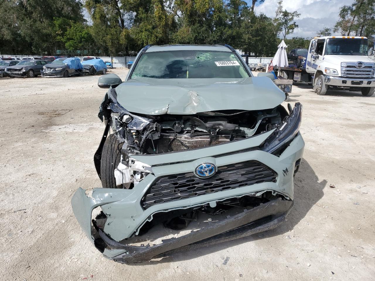 2022 Toyota RAV 4 VIN JTMB6RFV0ND063663 Copart auction photo, front end / side damage thumbnail 5