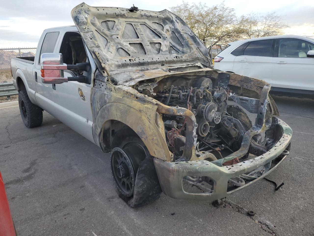 2014 Ford F250 VIN 1FT7W2B63EEA32798 Copart auction photo, burn - interior / burn damage thumbnail 4