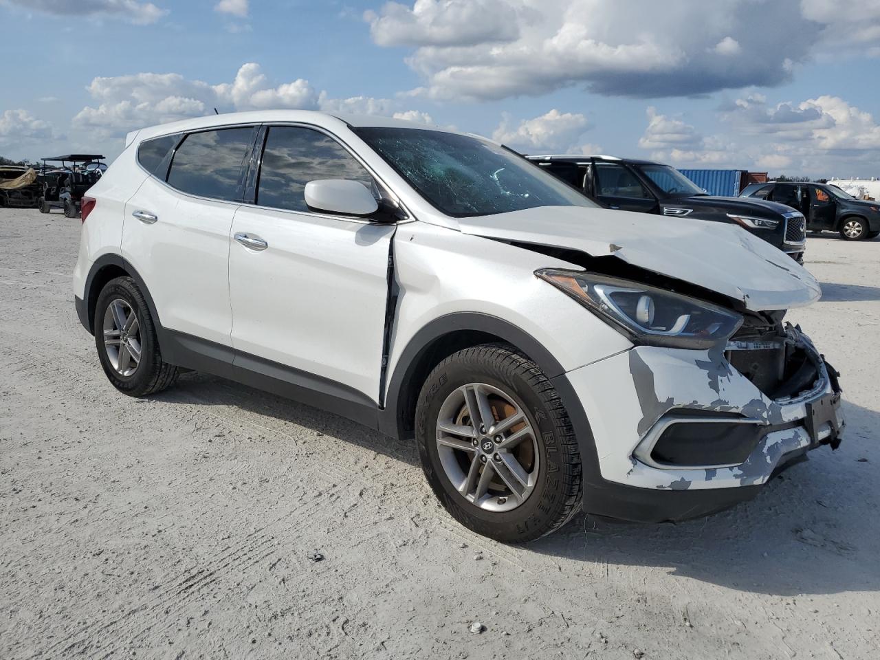 2018 Hyundai Santa Fe VIN 5NMZT3LB6JH101431 Copart auction photo, front end damage thumbnail 4
