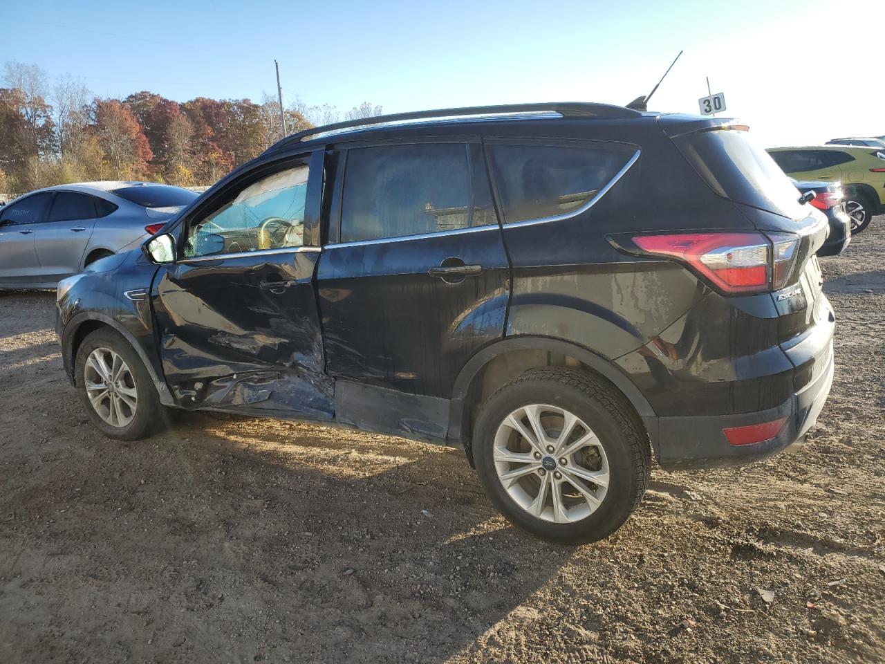 2018 Ford Escape VIN 1FMCU0GD8JUD18724 Copart auction photo, side / minor dent/scratches damage thumbnail 2