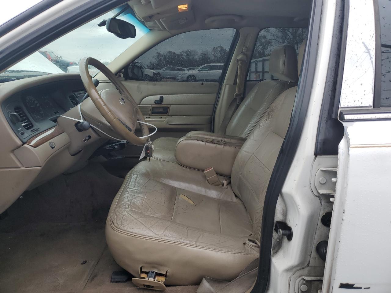2004 Ford Crown Victoria VIN 2FAFP74W54X182465 Copart auction photo, front end / side damage thumbnail 7