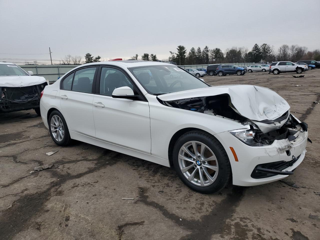2017 BMW 3er VIN WBA8E1G57HNU14769 Copart auction photo, front end damage thumbnail 4