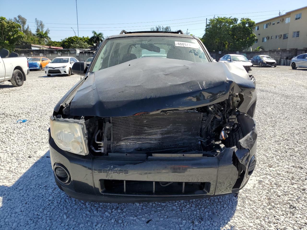 2011 Ford Escape VIN 1FMCU0C74BKC40164 Copart auction photo, front end / minor dent/scratches damage thumbnail 5