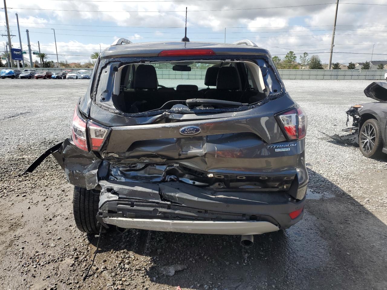 2017 Ford Escape VIN 1FMCU0JDXHUC73126 Copart auction photo, rear end damage thumbnail 6
