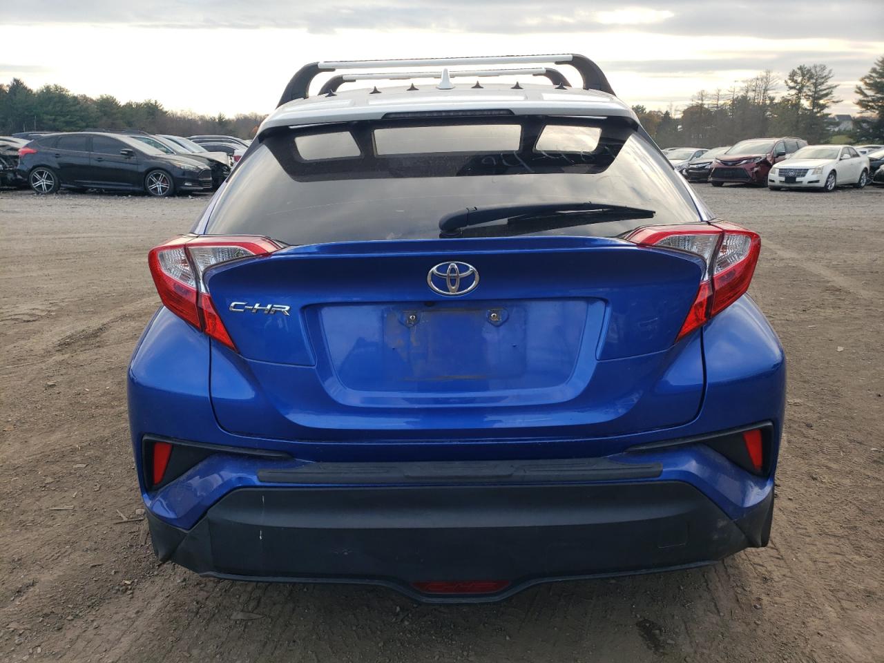 2018 Toyota C-HR VIN NMTKHMBX3JR009226 Copart auction photo, side / undercarriage damage thumbnail 6