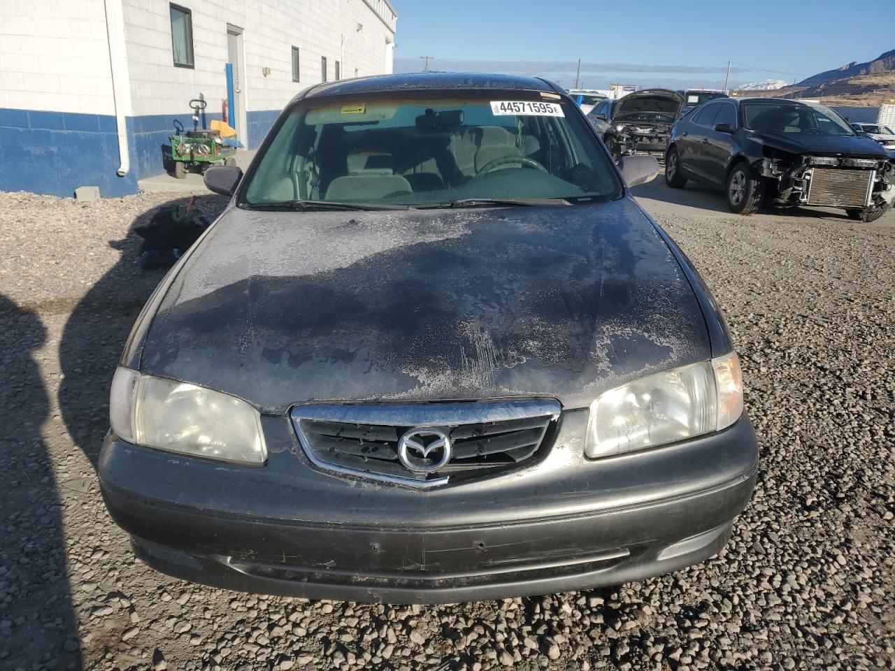 2000 Mazda 626 VIN 1YVGF22D5Y5120152 Copart auction photo, mechanical damage thumbnail 5