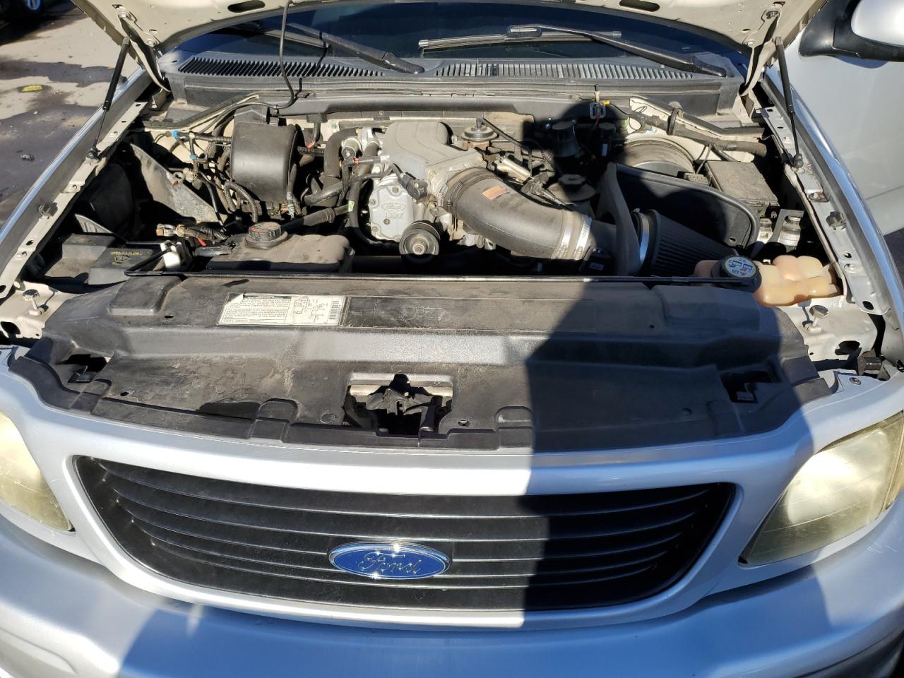 2001 Ford F-150 VIN 2FTZF07311CA70851 Copart auction photo, side damage thumbnail 11