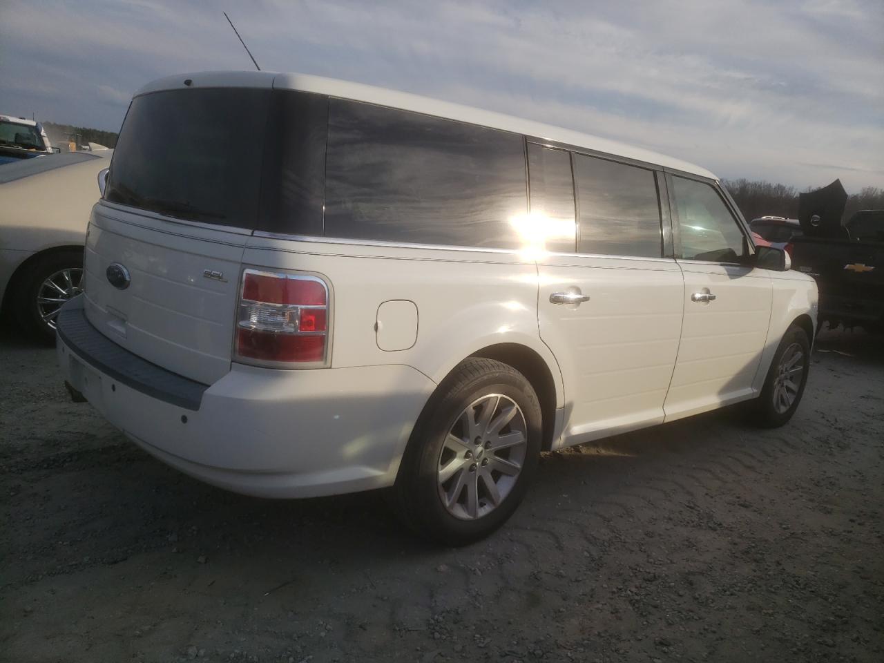 2011 Ford Flex VIN 2FMGK5CCXBBD11296 Copart auction photo, side / minor dent/scratches damage thumbnail 3