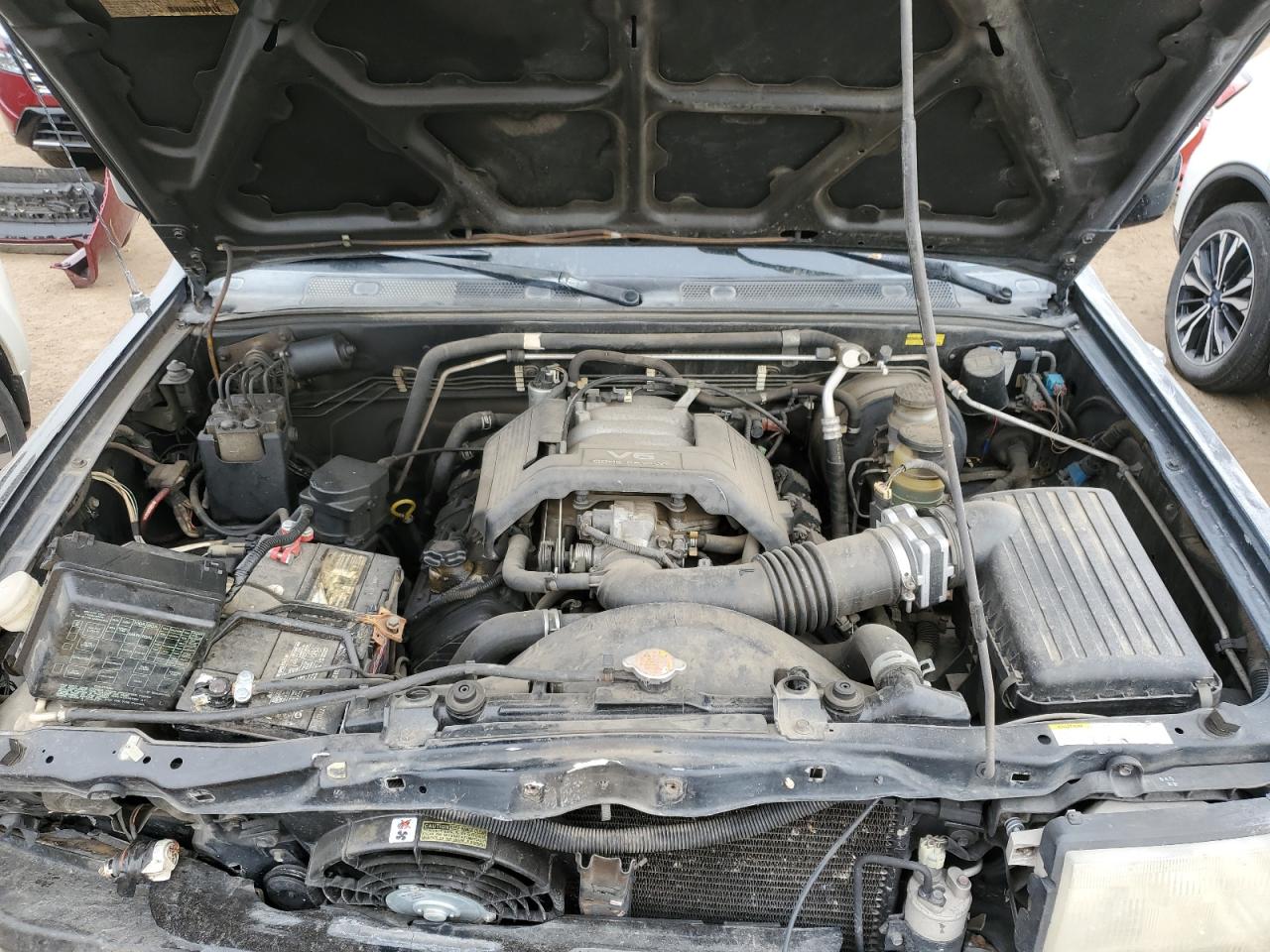 1999 Isuzu Rodeo VIN 4S2CM58W4X4339262 Copart auction photo, front end damage thumbnail 13