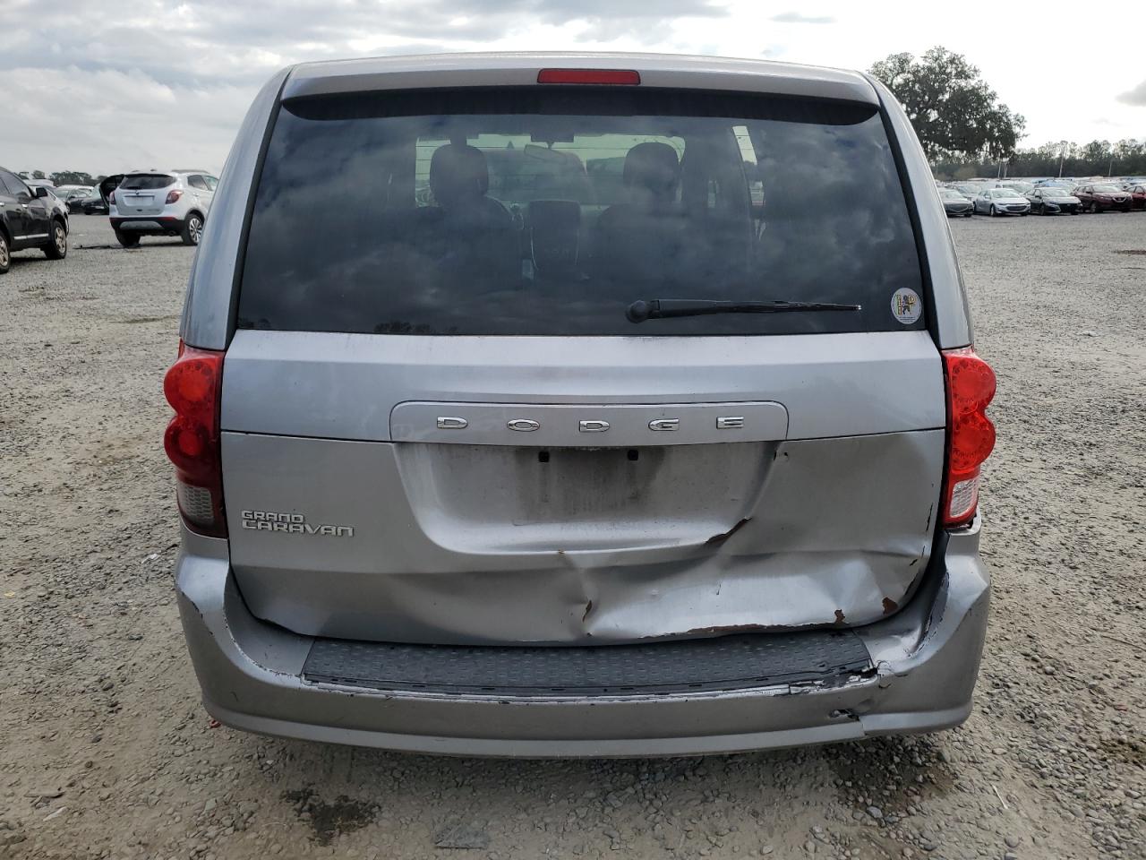 2016 Dodge Caravan VIN 2C4RDGBG9GR124752 Copart auction photo, side / rear end damage thumbnail 6